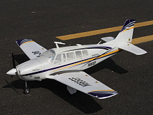 Радиоуправляемый самолет Top RC ST Beechcraft Bonanza A36 фиолетовый 1280мм шасси PNP